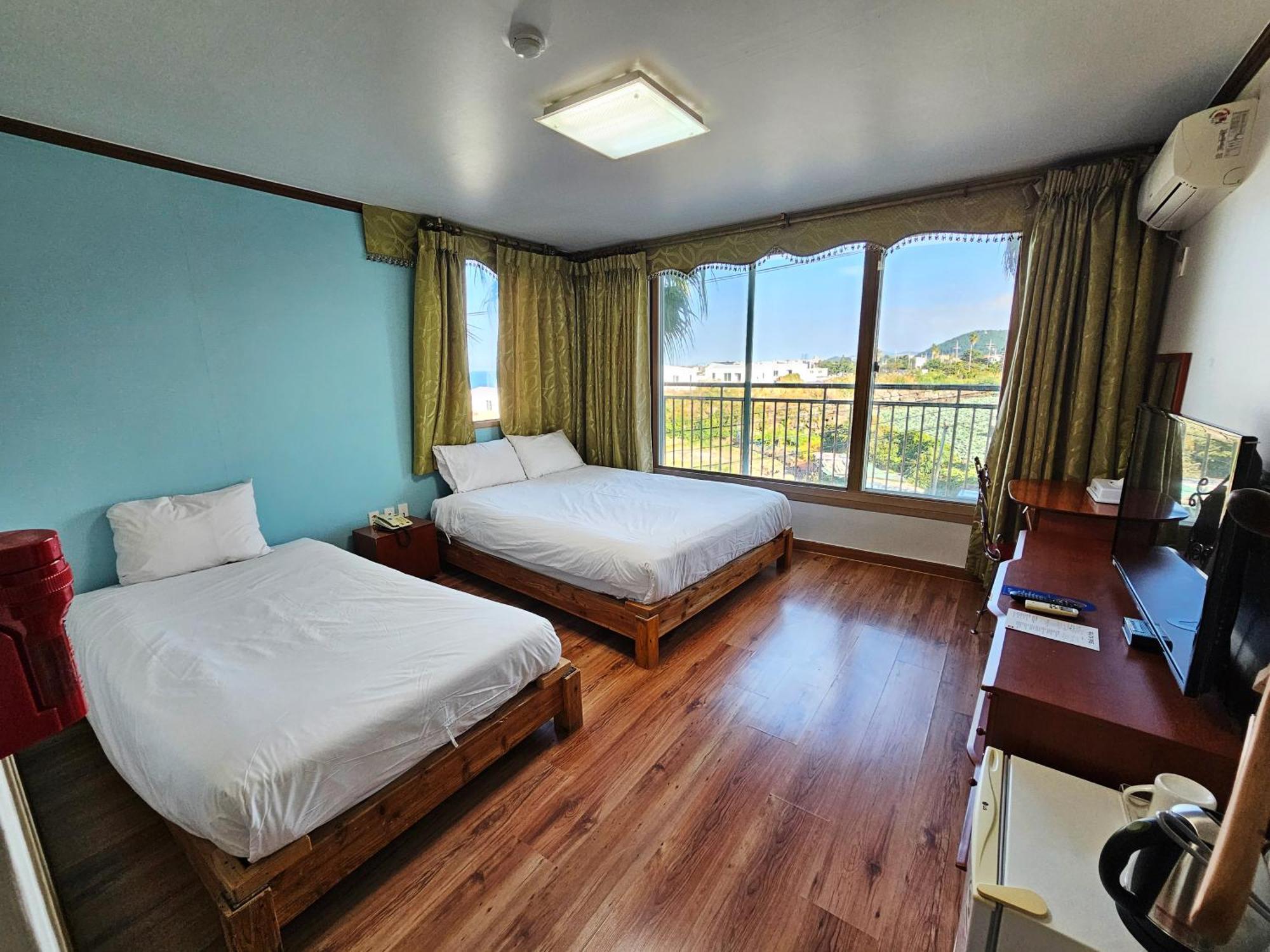 Sea Cliff Hotel Jeju Værelse billede